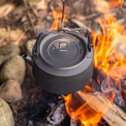 Burning a titanium kettle over a campfire.